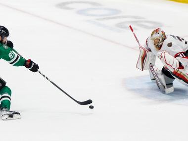 Dallas Stars center Tyler Seguin (91) scores a goal past Ottawa Senators goaltender Anton...