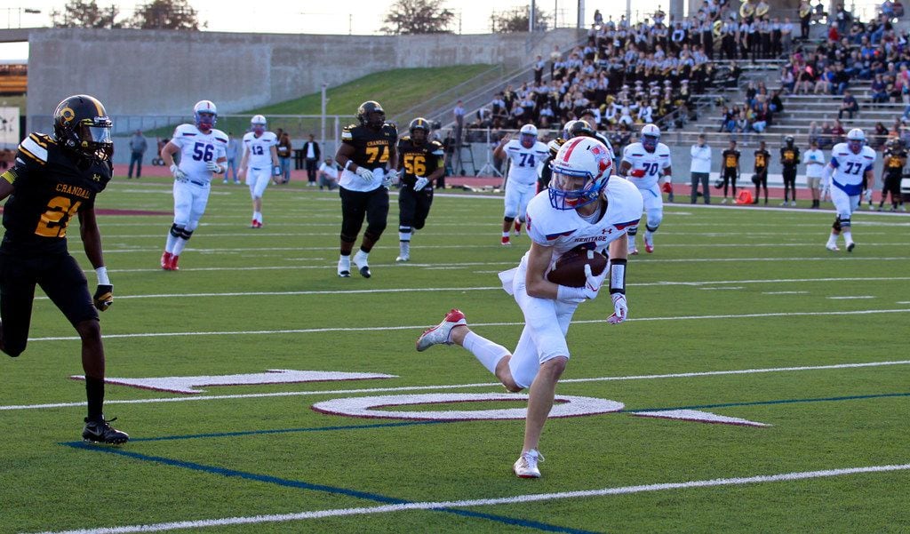 Midlothian Heritage's Jay Wilkerson (8) is wide open and takes his pass reception to the end...