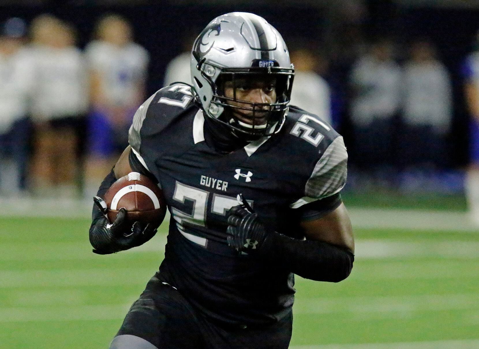 Guyer High School running back Byron Phillips Jr. (27) takes off for the end zone after making a catch in the backfield during the first half as Denton Guyer High School played Trophy Club Byron Nelson High School in a Class 6A Division II Region I semifinal football game at The Ford Center in Frisco on Saturday, November 27, 2021. (Stewart F. House/Special Contributor)