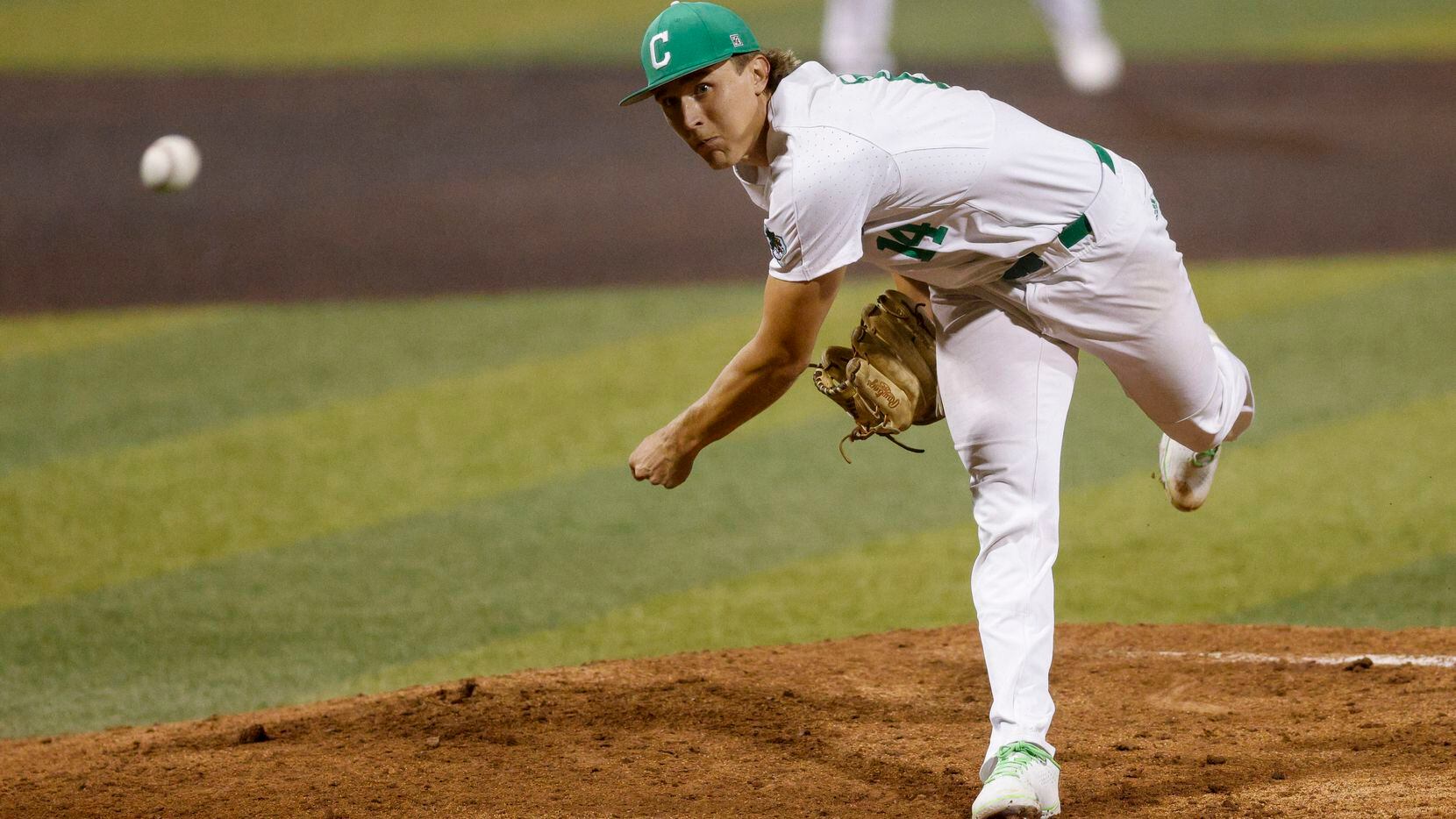 Southlake Carroll starting pitcher Griffin Herring (14) delivers a pitch during the sixth...