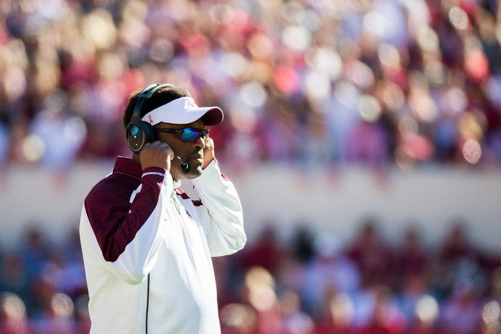 Texas A&M head coach Kevin Sumlin looks on from the sidelines during the first half of an...