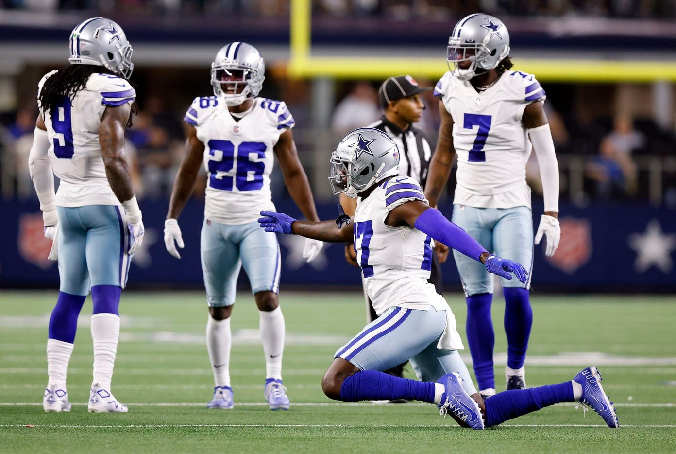 Dallas Cowboys safety Jayron Kearse (27) struts off the field after their big stop of the...