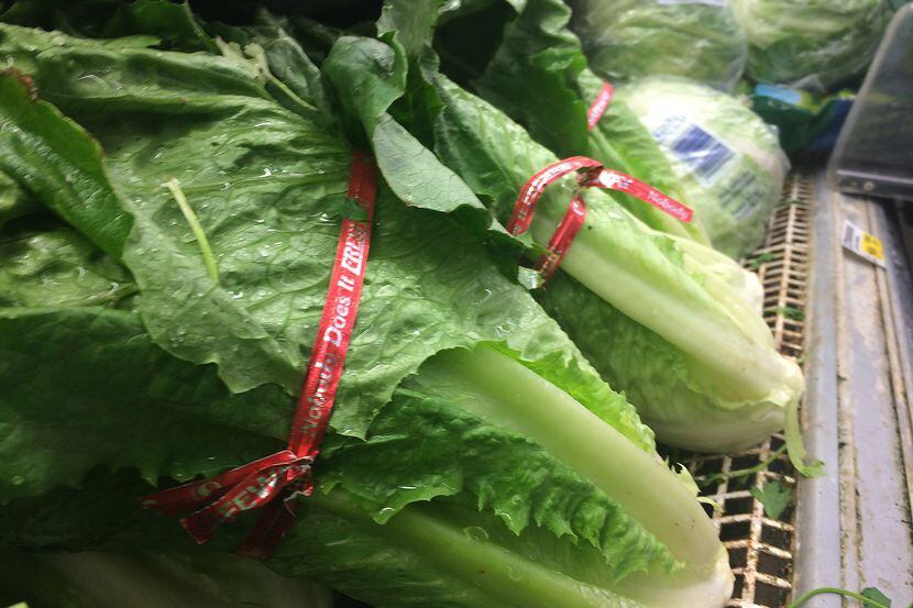 Romain lettuce is displayed in the produce section of Tom Thumb at the corner of Meadow Rd...
