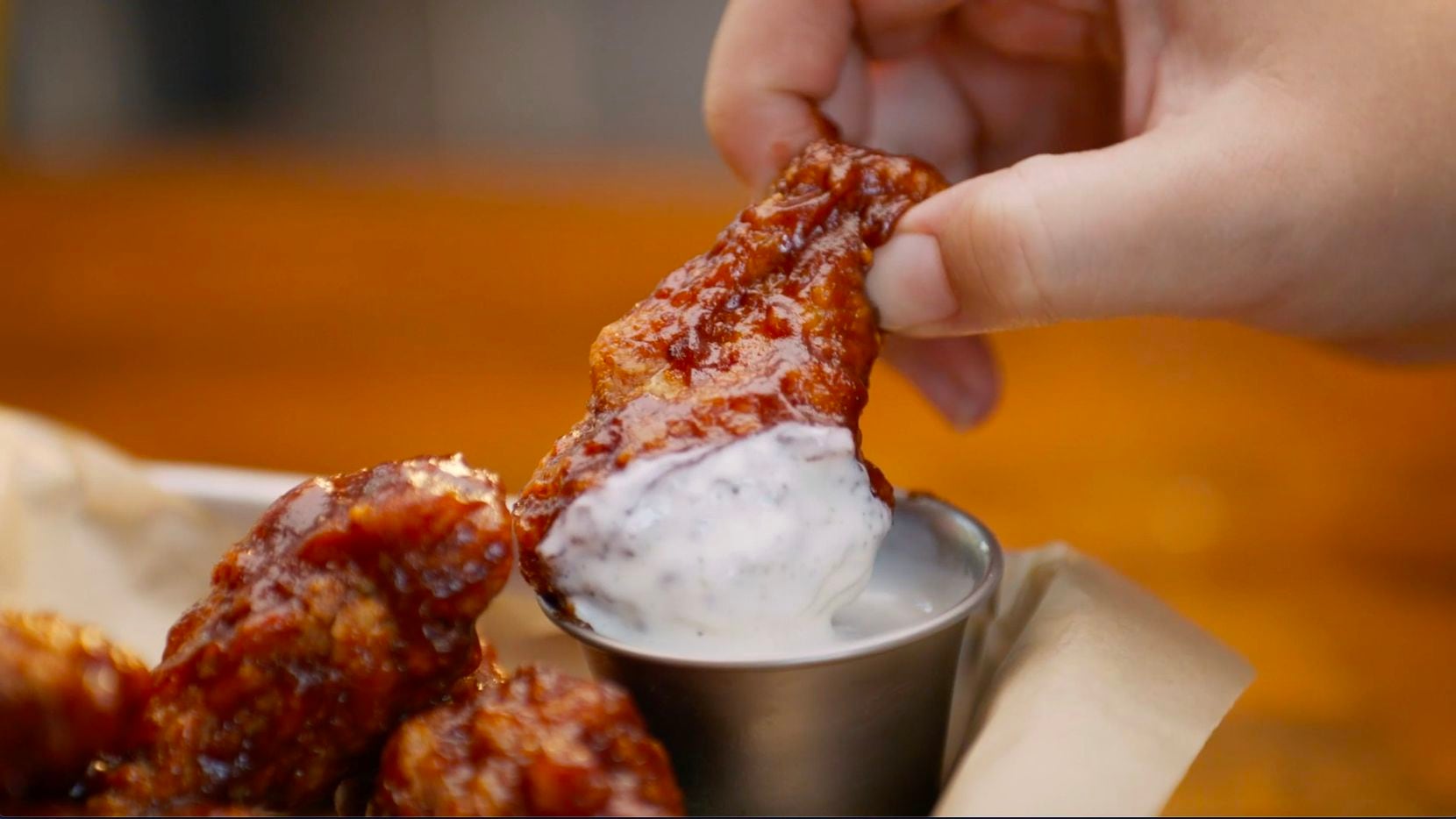 Hoots Wings, a Hooters offshoot, sells a menu of wings, buffalo shrimp and loaded tots in a...