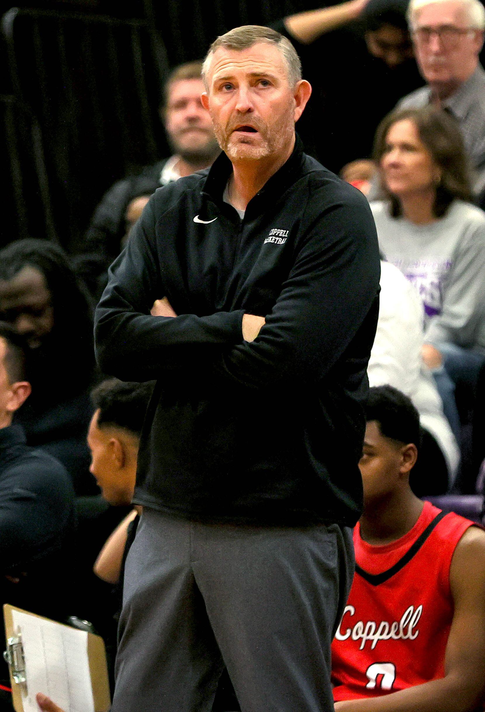 Coppell head coach Clint Schnell looks up at the scoreboard during the second half against Richardson in a 6A nondistrict boys high school basketball game played on December 7, 2021 at Richardson High School in Richardson.  (Steve Nurenberg/Special Contributor)