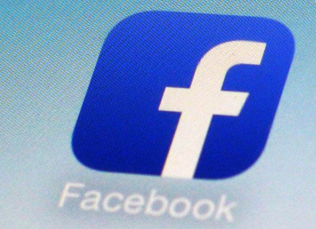 This Feb. 19, 2014, file photo, shows a Facebook app icon on a smartphone in New York. South...