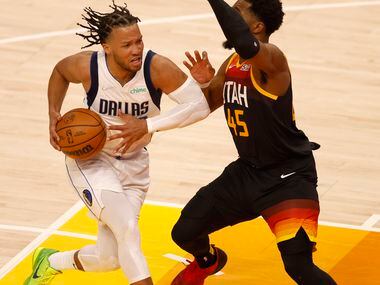 Dallas Mavericks guard Jalen Brunson (13) drives towards the basket as Utah Jazz guard...