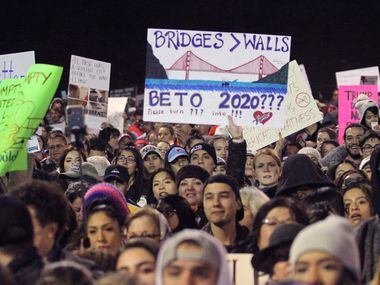 People attend an outdoor rally for former U.S. Rep. Beto O'Rourke outside the El Paso County...