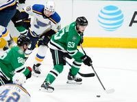 Dallas Stars center Wyatt Johnston (53) controls the puck on an attack as St. Louis Blues'...
