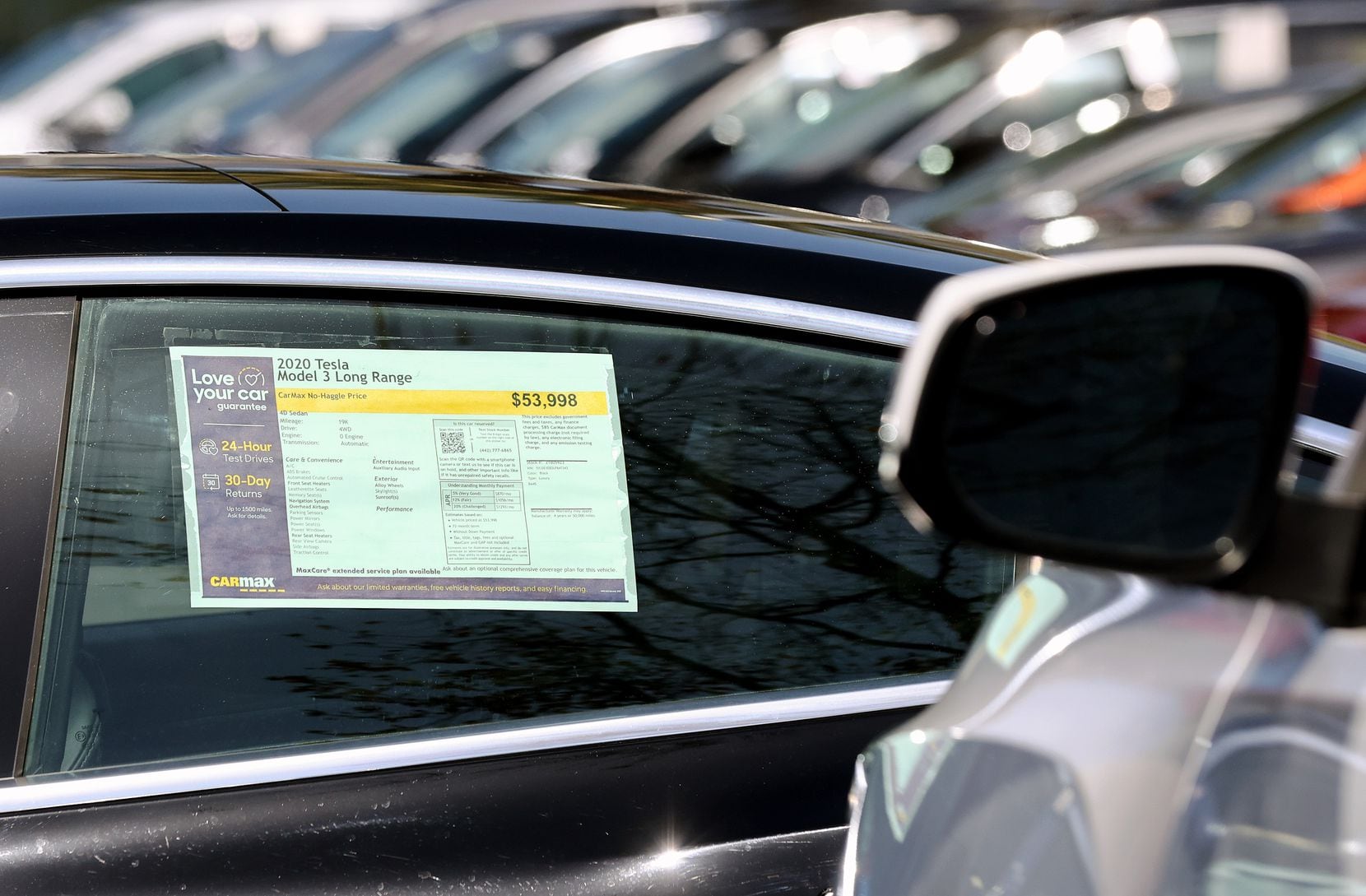 A used 2020 Tesla Model 3 is shown on a CarMax lot on March 10 in Burbank, Calif. 