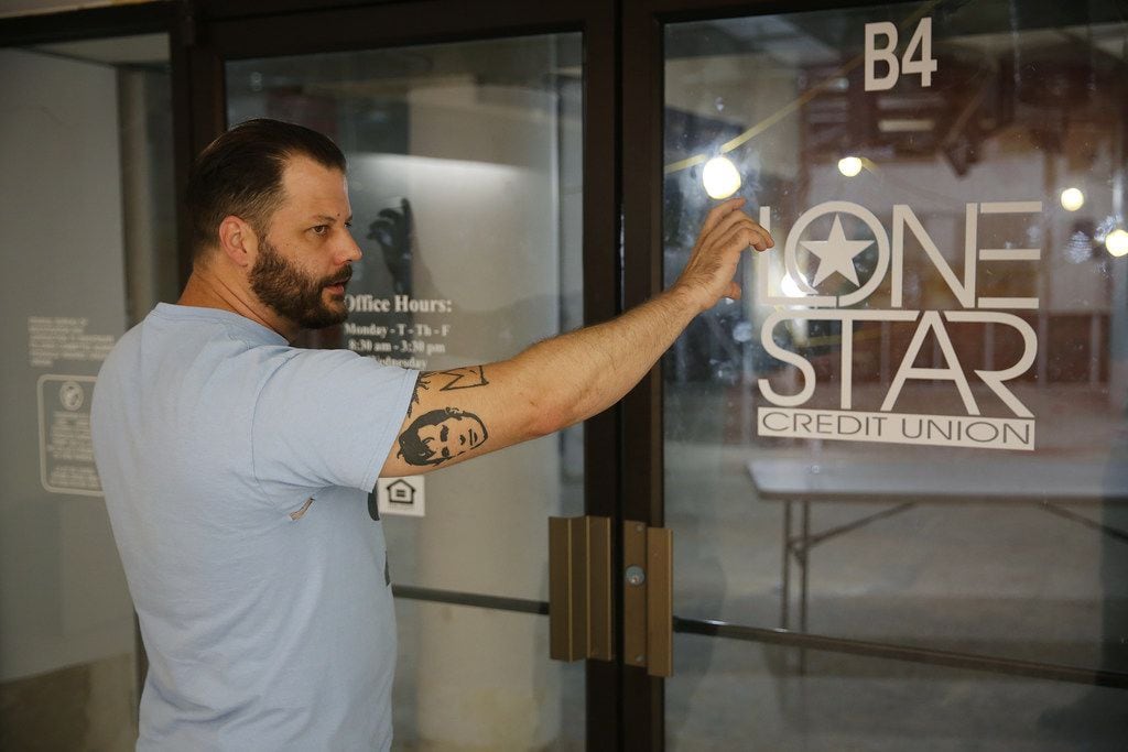 Chef Chad Houser, founder of Cafe Momentum, leads a tour of the future space of a community...