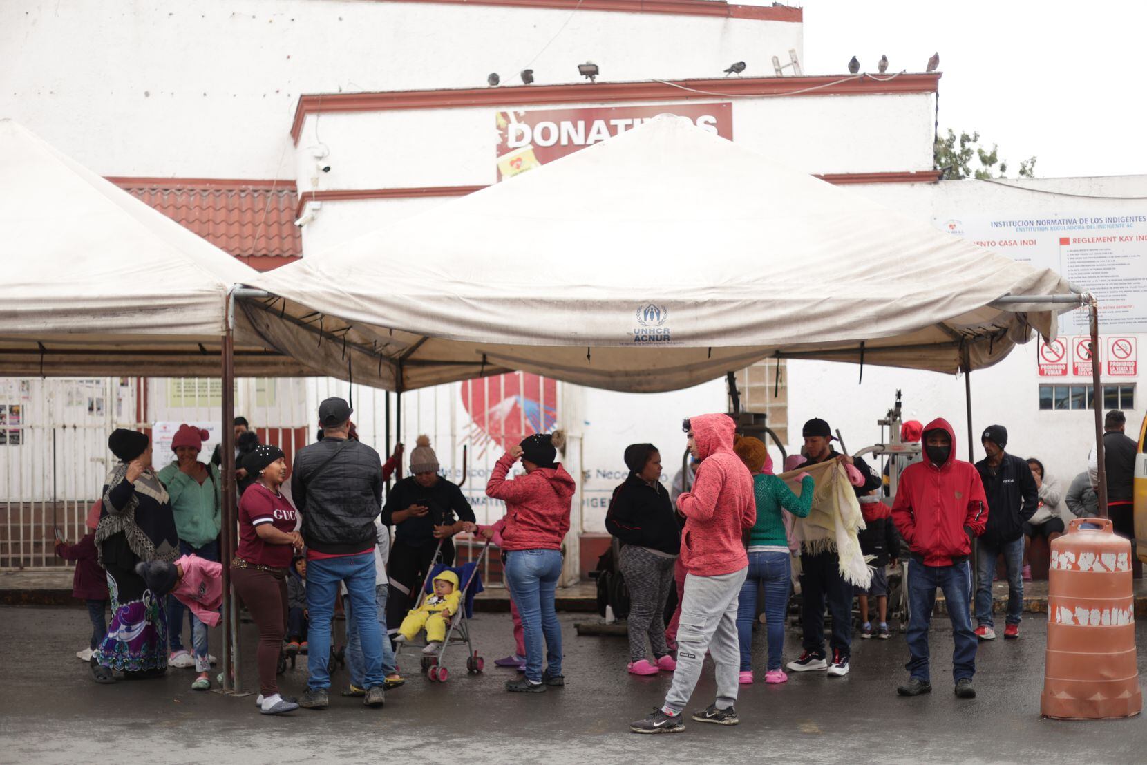 Migrants arrive at Casa Indi in Monterrey, Mexico, where they find temporary refuge on their...
