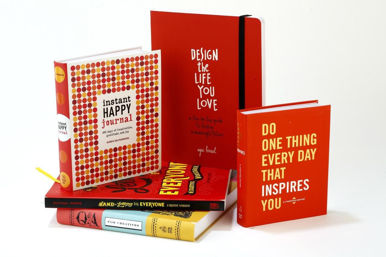 "Instant Happy Journal," "Design the Life You Love," "Do One Thing Every Day That Inspires...