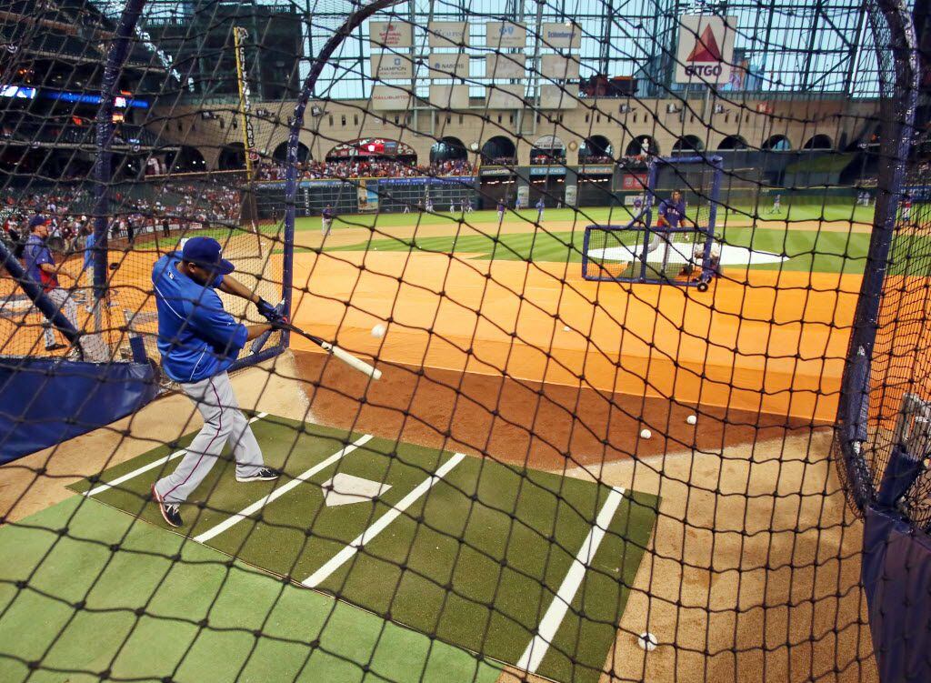 Texas outfielder Nelson Cruz hits during batting practice before the Texas Rangers vs....