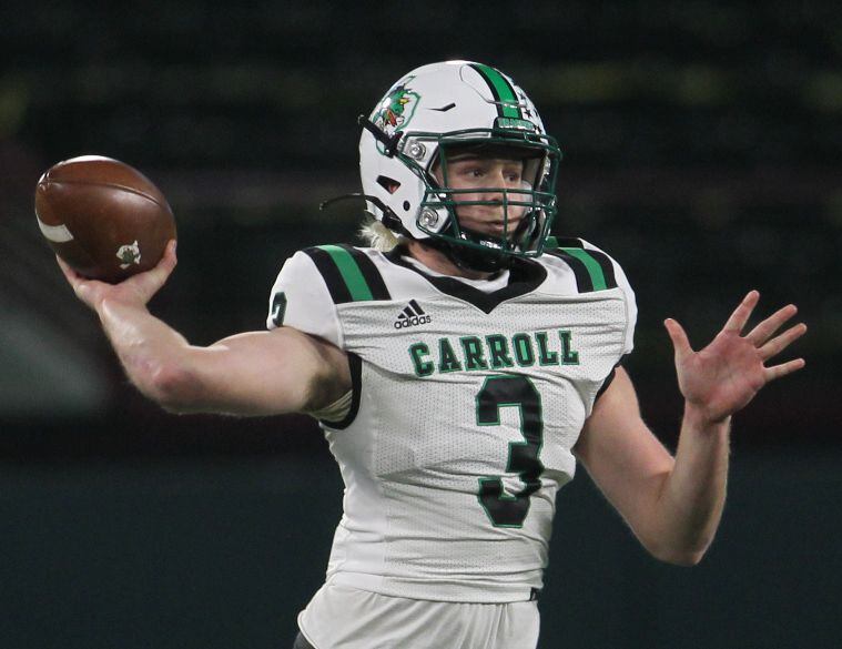 Southlake quarterback Quinn Ewers (3) launches a pass downfield during first half action...
