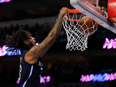 Dallas Mavericks forward Marquese Chriss dunks during the second half of an NBA basketball game against the Minnesota Timberwolves in Dallas, Tuesday, December 21, 2021.