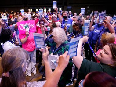 Delegates in District 2 vote during the first round of voting for Texas Democratic Party...