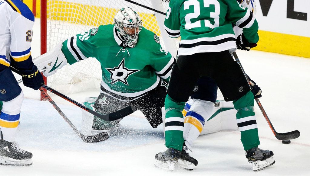 Dallas Stars goaltender Anton Khudobin (35) makes a stop by the St. Louis Blues during the...