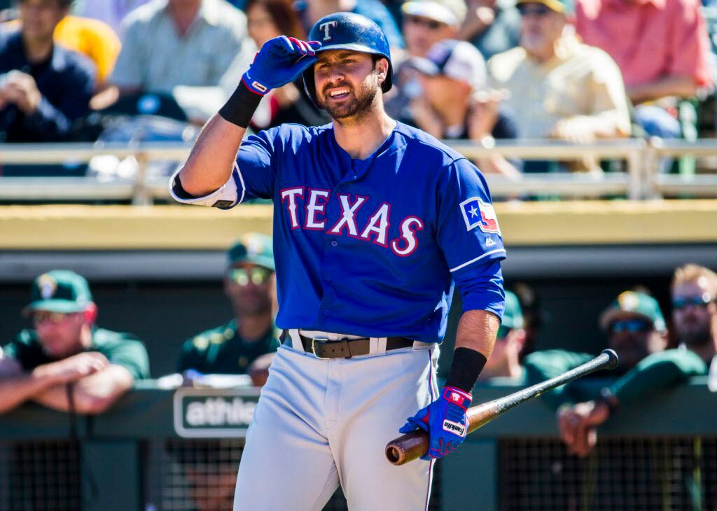 Texas Rangers designated hitter Joey Gallo (13) walks back to the dugout after striking out during the first inning of a spring training game against he Oakland Athletics on Thursday, March 2, 2017 at Hohokam Stadium in Mesa, Arizona. (Ashley Landis/The Dallas Morning News)