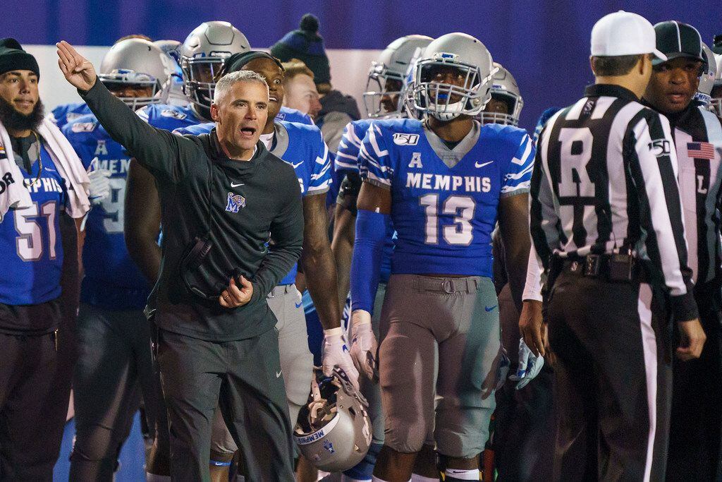 Memphis head coach Mike Norvell argues for a call during the second half of an NCAA football...