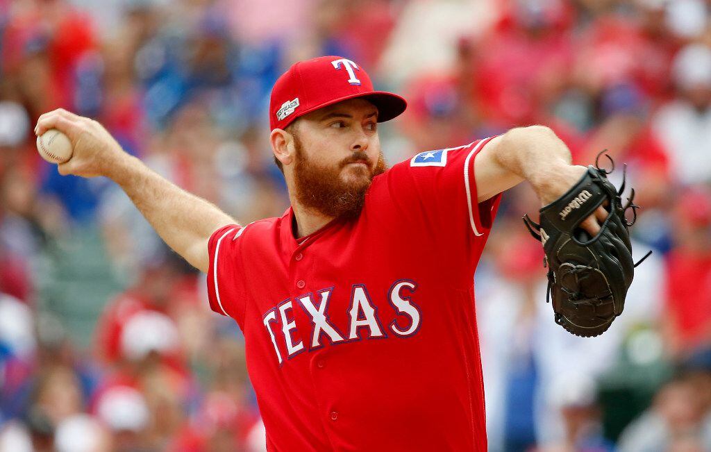 Texas Rangers relief pitcher Sam Dyson throws a pitch against Toronto Blue Jays during the...