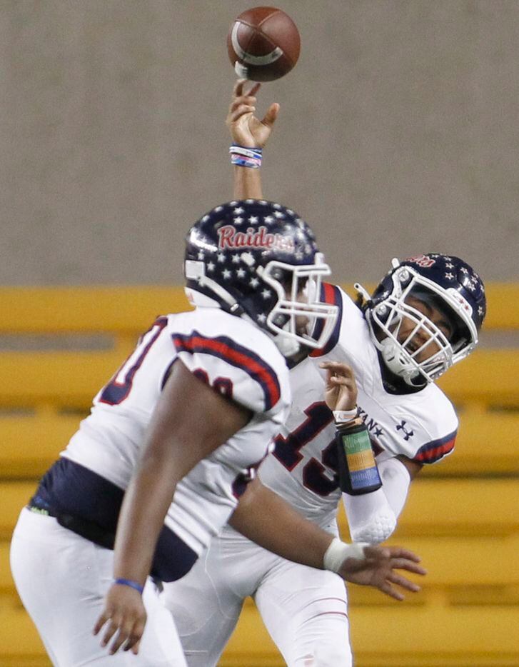 Denton Ryan quarterback Khalon Davis (15) launches a long pass behind the protection of offensive lineman Joseph Riley (60) during 2nd quarter action against College Station. The two teams played their Class 5A Division 1 Region ll final playoff football game at Baylor's McLane Stadium in Waco on December 3, 2021. (Steve Hamm/ Special Contributor)