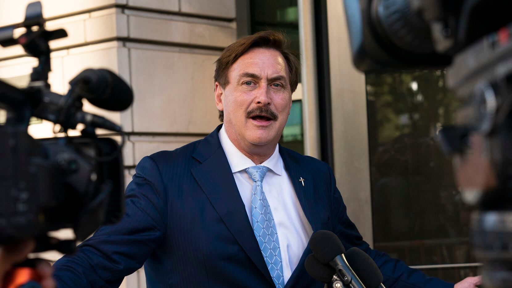FILE - MyPillow chief executive Mike Lindell speaks to reporters outside federal court in...
