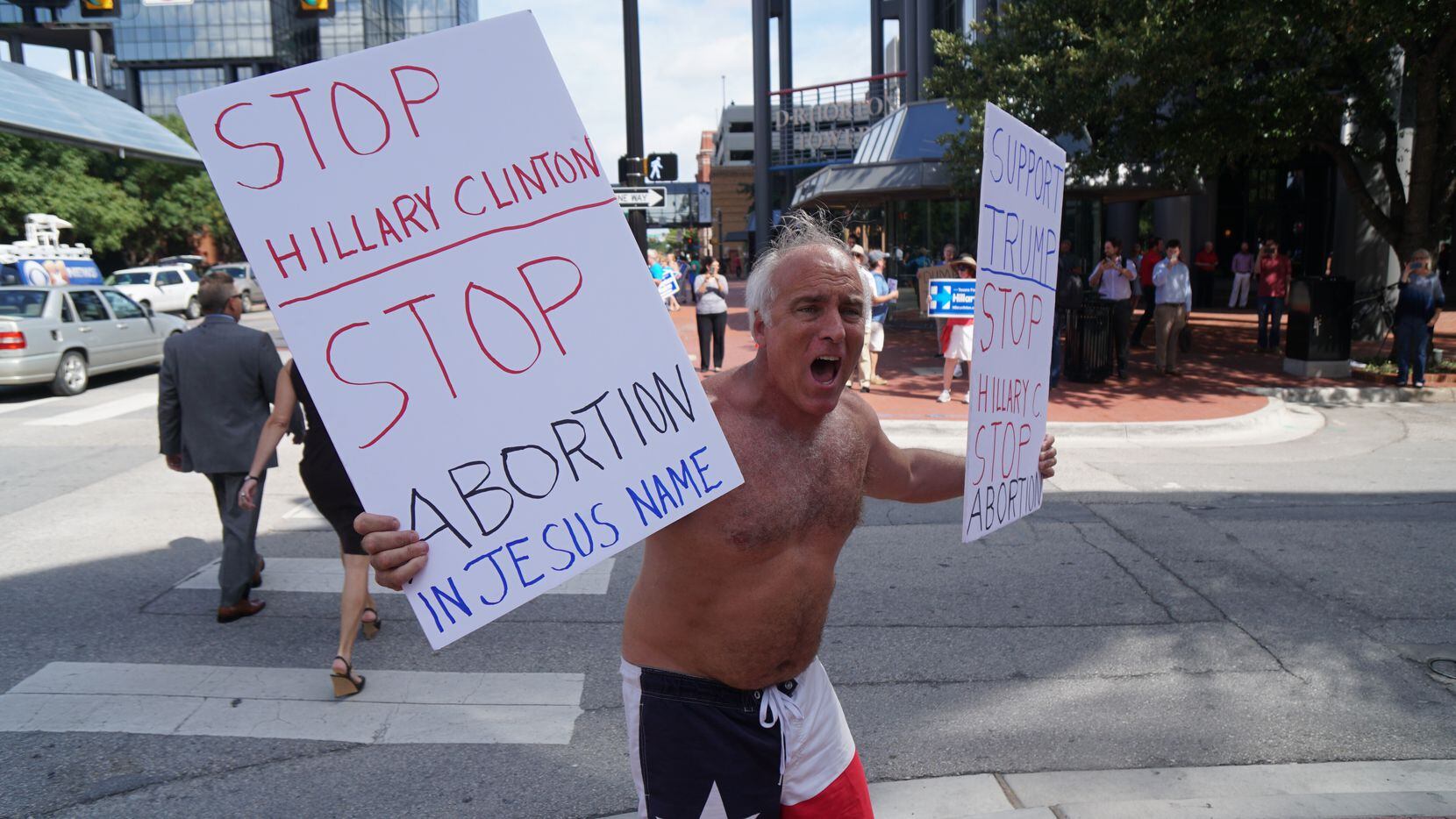 Donald Trump supporter Rives Grogan demonstrated outside a Republican fundraiser attended by...