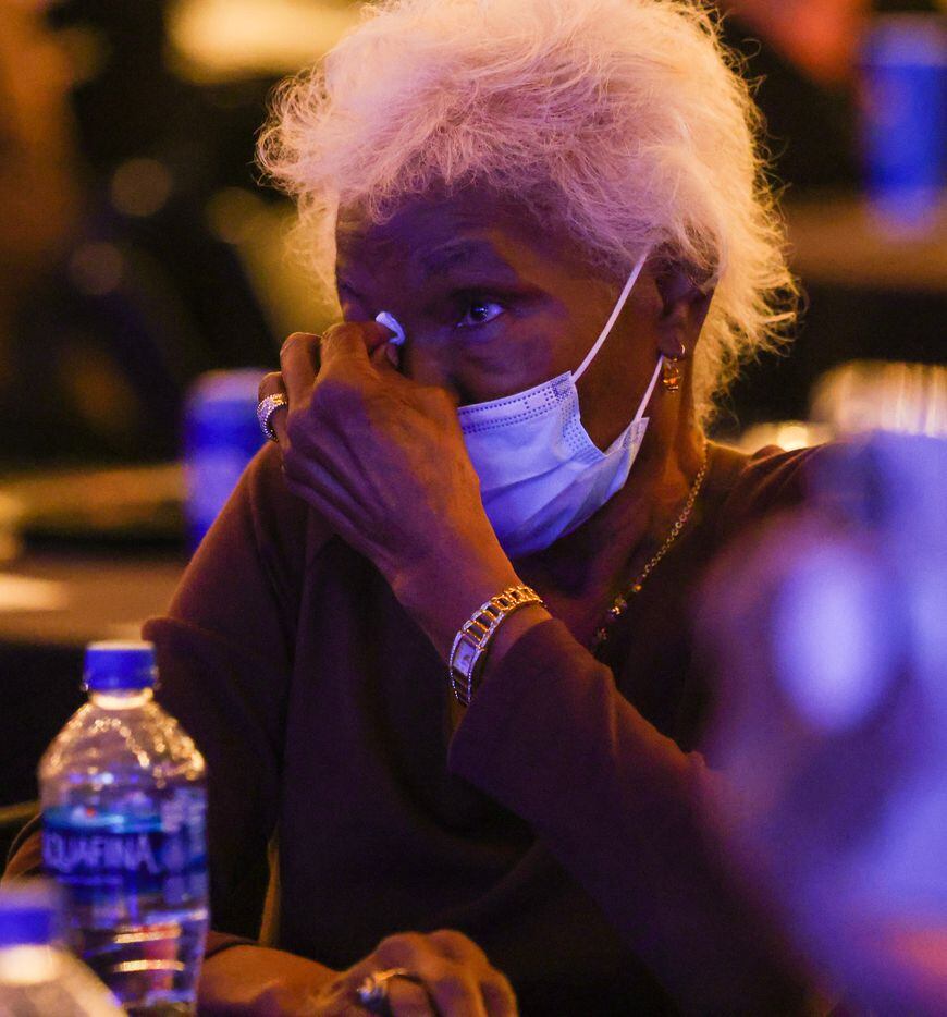 Jessie Parks, grandmother of Venton Jones, wipes at the tears in her eyes as Jones shares a...