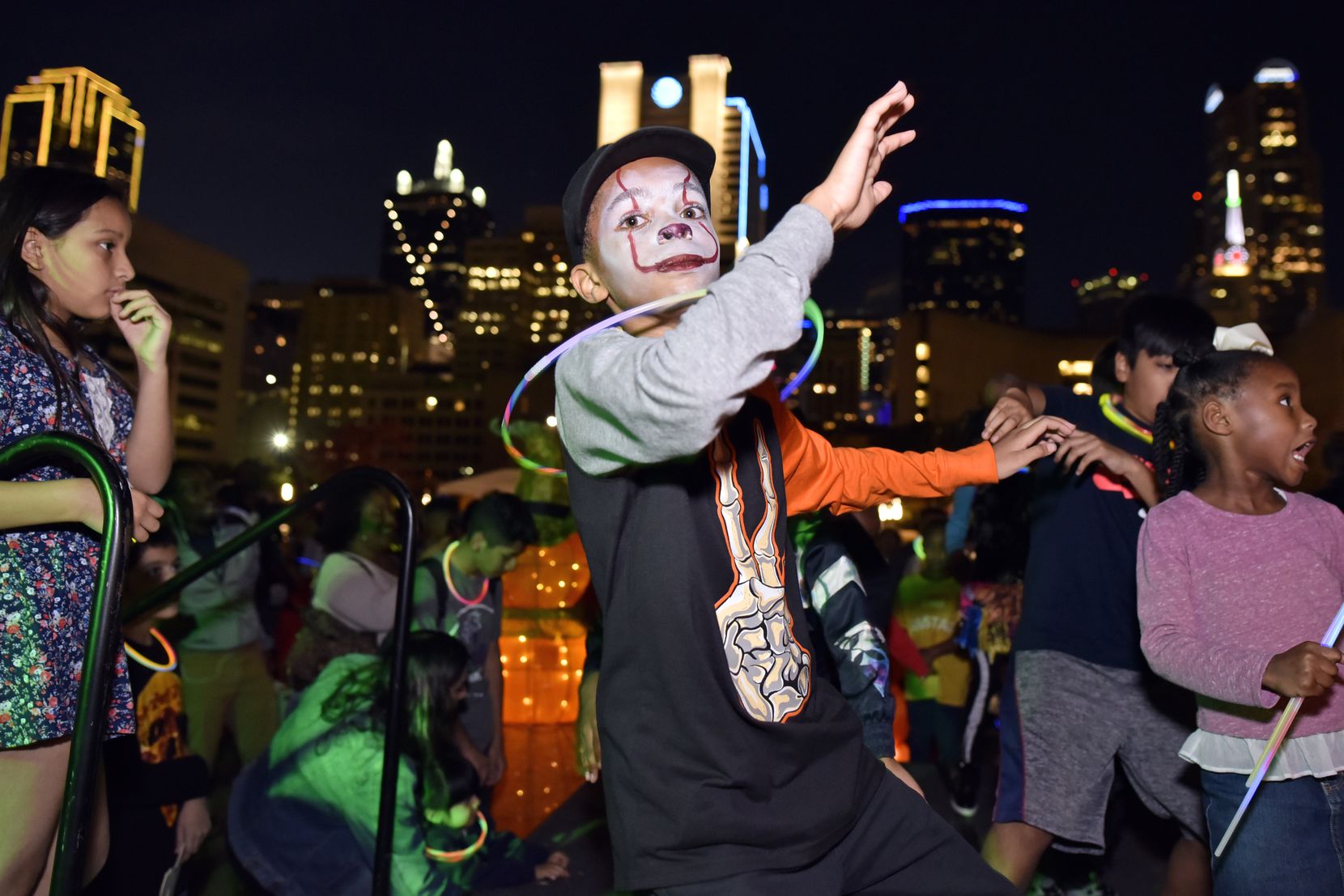 At last year’s Pumpkins of the Plaza party, Trikee Ross, wearing face paint and a glow...
