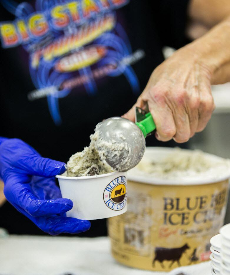 Sylvia Schmidt scoops Blue Bell Ice Cream to serve to customers on Monday, November 2, 2015...