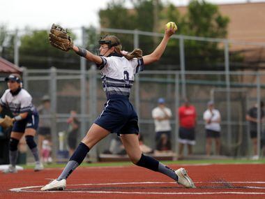 Flower Mound High School player #9, Abigail Jennings, pitches during a softball game against...