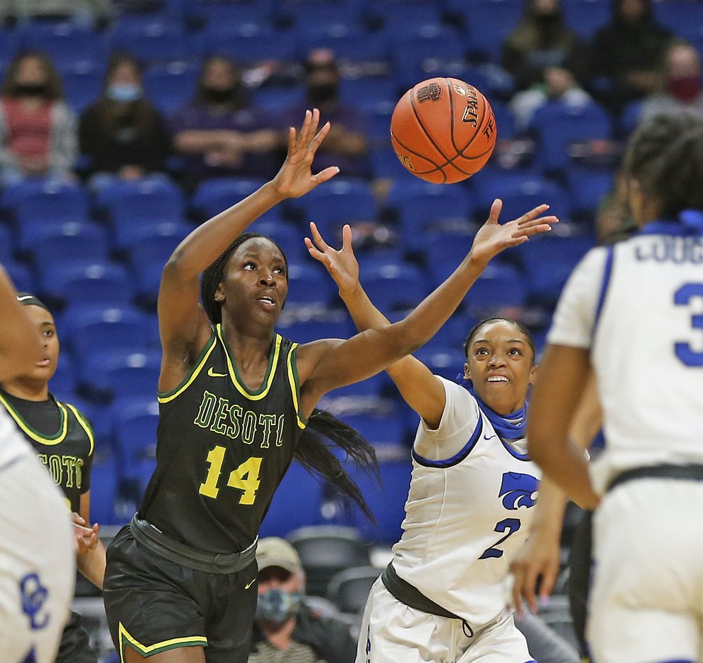 DeSoto Amina Muhammad #14 reaches for a rebound. DeSoto vs. Cypress Creek girls basketball...