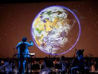 Julien Benichou leading an Oct. 29, 2021 performance of 'The Way of the Rain -- Hope for...
