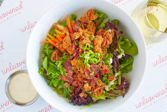 The Weekender bowl at Unleavened Fresh Kitchen came with fried chicken, bacon, lettuce,...