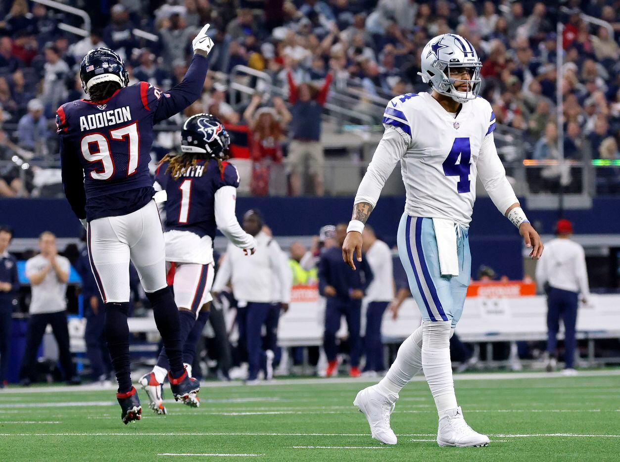 Dallas Cowboys quarterback Dak Prescott (4) walks to the sideline after Houston Texans...