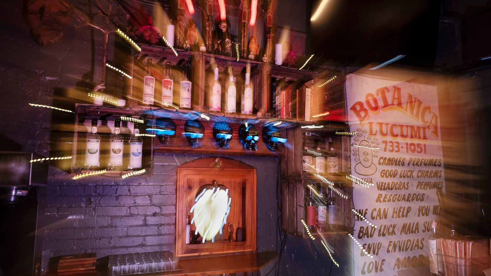 This photograph was made with a slow camera shutter behind the bar at the Spirits Room...