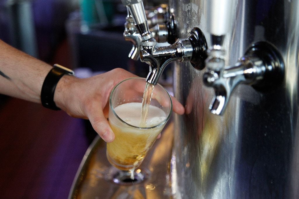File photo of draft beer on tap. 