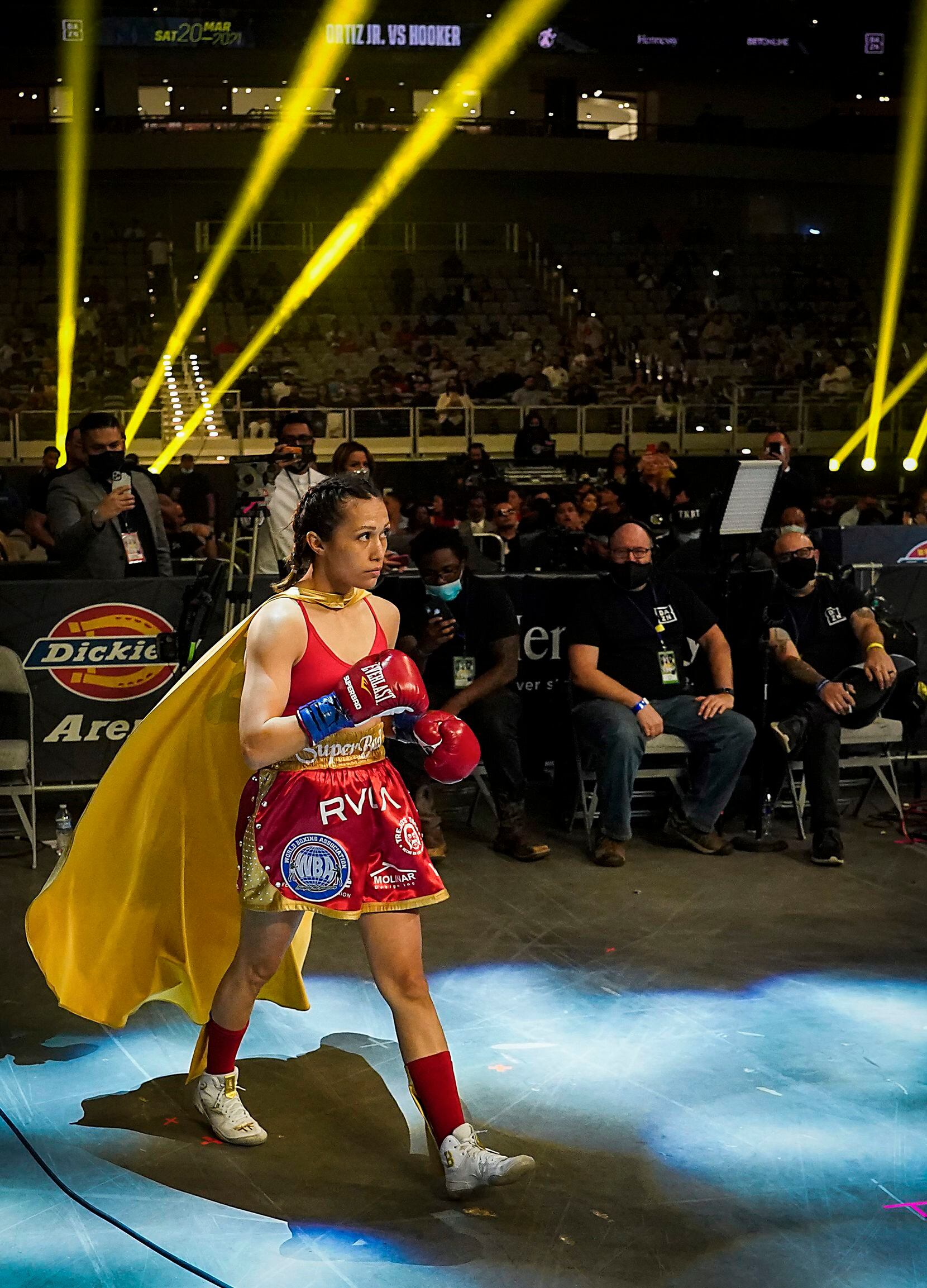Seniesa Estrada enters the ring to fight Anabel Ortiz for the WBA women’s strawweight title at Dickies Arena on Saturday, March 20, 2021, in Fort Worth.