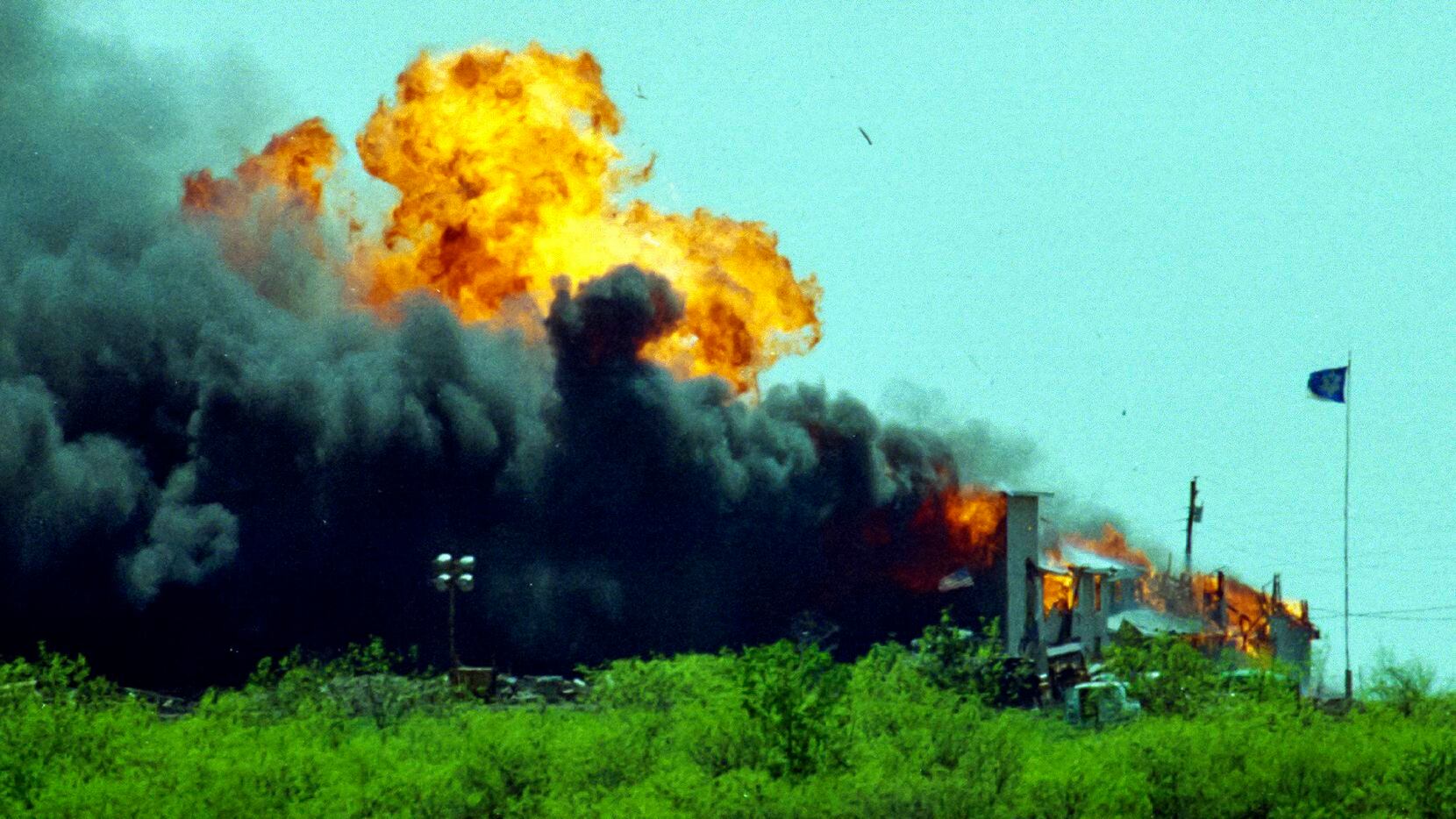 The Branch Davidian compound was rocked by an explosion after the Davidians set fire to it...