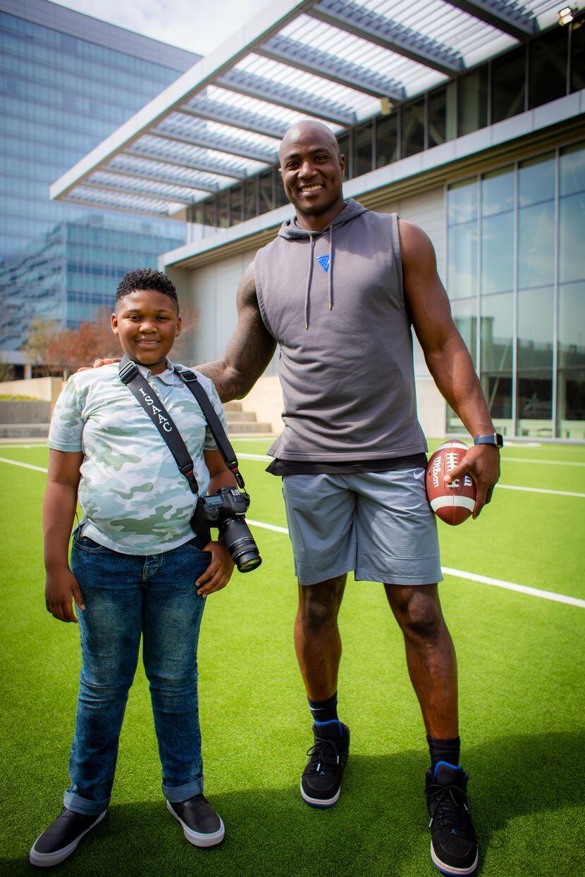 Dallas teen Isaac Edwards and former Dallas Cowboys outside linebacker DeMarcus Ware at The...