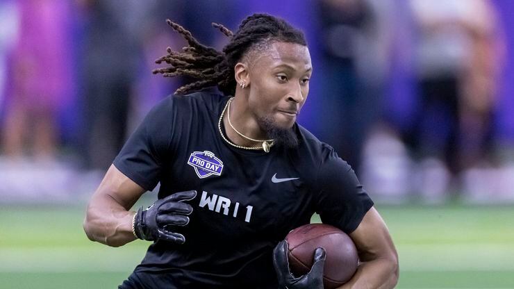 TCU football wide receiver Quentin Johnston carries a pass during NFL Pro Day, Thursday,...