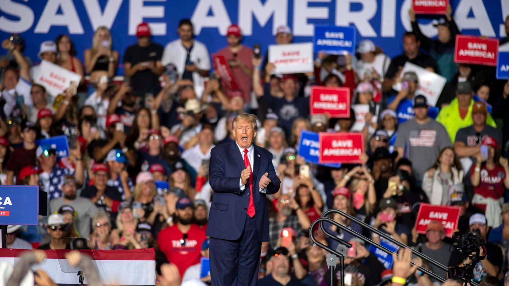 FILE - Former President Donald Trump applauds while speaking at a rally at the Minden Tahoe...