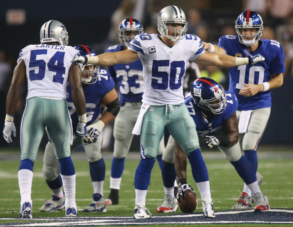 Dallas Cowboys inside linebacker Sean Lee (50) calls defensive signals as New York Giants...