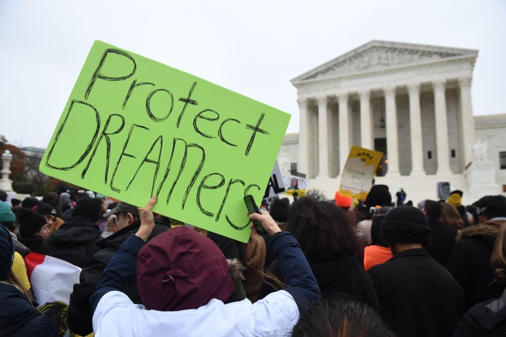 Young Dreamers demonstrate at the Supreme Court building, in defense of Deferred Action for...