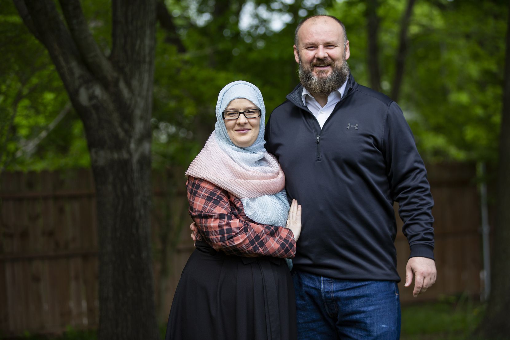 Amira Hopovac (left) and husband Denis Hopovac pose for a photo outside of their home on April 11, 2020 in Garland. The COVID-19 pandemic will alter the way many families observe Ramadan. (Juan Figueroa/ The Dallas Morning News)