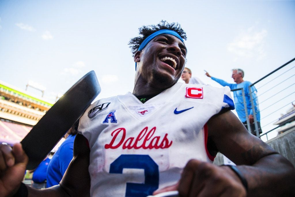 Southern Methodist Mustangs wide receiver James Proche (3) runs in the tunnel with the "Iron...