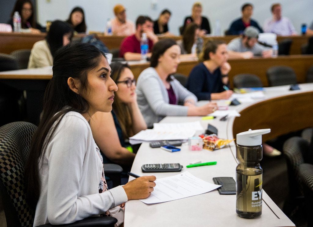 Students listen during an accounting class at Southern Methodist University's Cox School of...