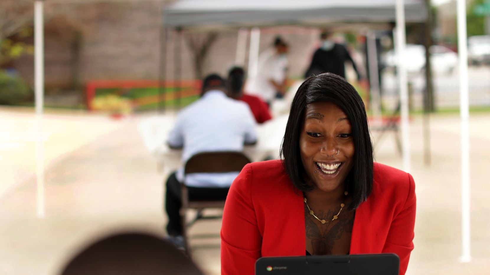 Shaterica Asberry attends a job fair at the T.R. Hoover Multipurpose Center in Dallas, TX,...