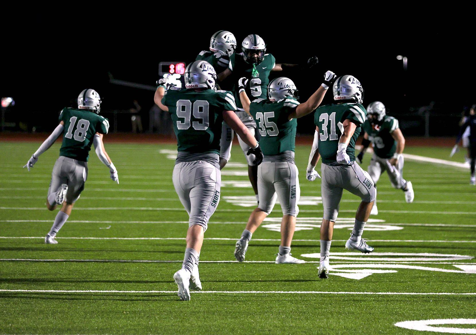 Frisco Reedy celebrates their victory over Frisco Lone Star, 13-7 in a high school football...